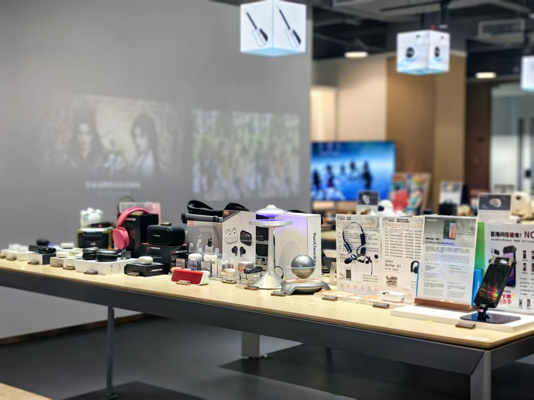 AI-enabled consumer electronics arranged on the showroom display table